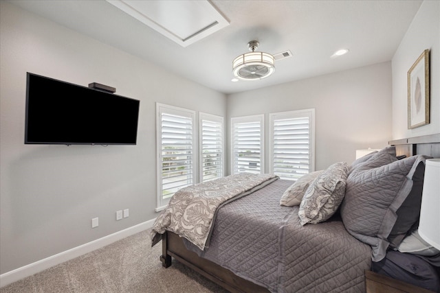 1335 Outrigger, Tiki Island, TX 77554 - carpeted bedroom featuring attic access and baseboards