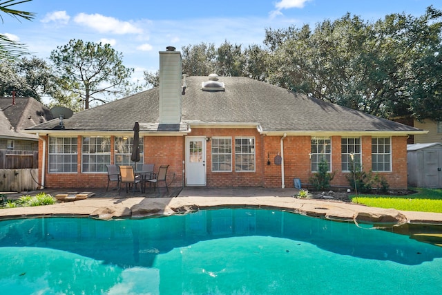 view of pool featuring a patio