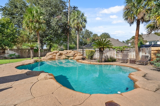 view of pool featuring a patio