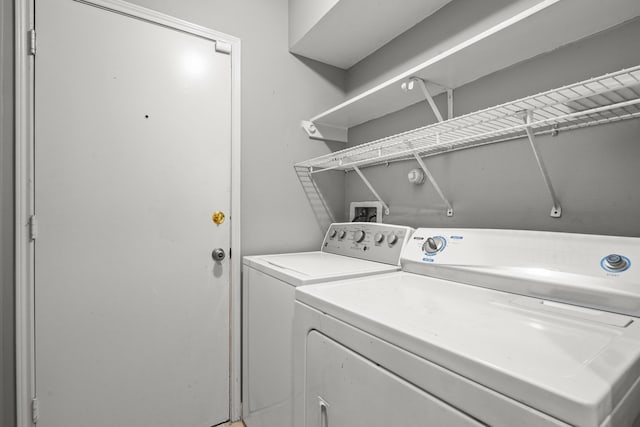 laundry area with washer and dryer