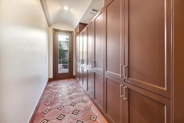 entryway with vaulted ceiling