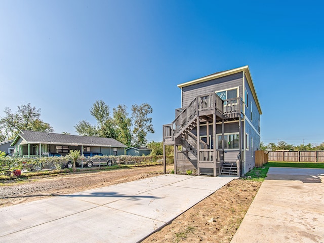 view of front of house with a wooden deck