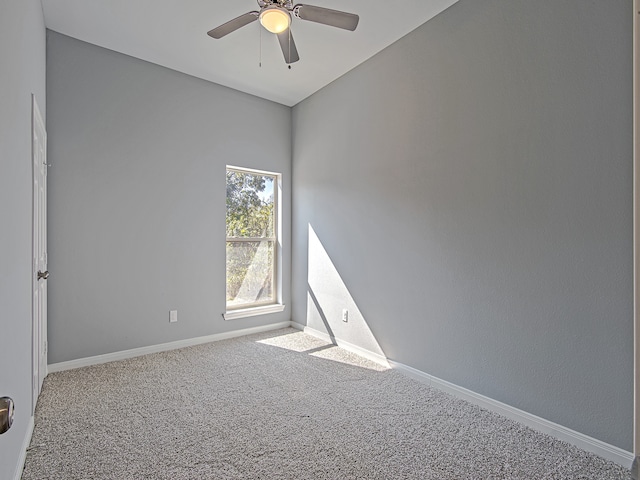 unfurnished room featuring carpet flooring