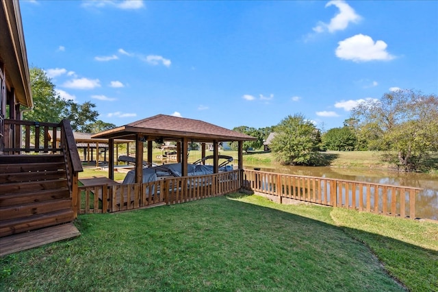 view of yard with a water view and a gazebo