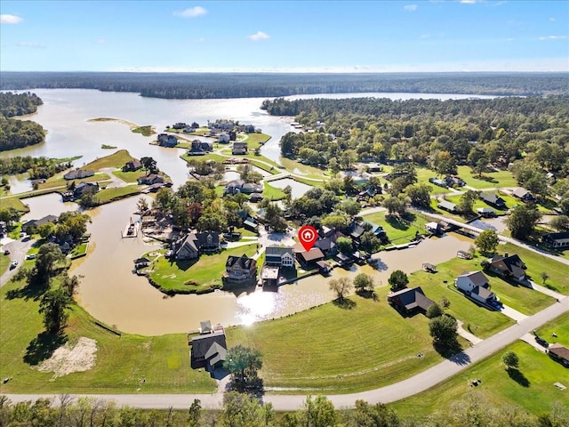 8 Hunters Creek Dr, Huntsville, TX 77340 - aerial perspective of suburban area with a nearby body of water and a heavily wooded area