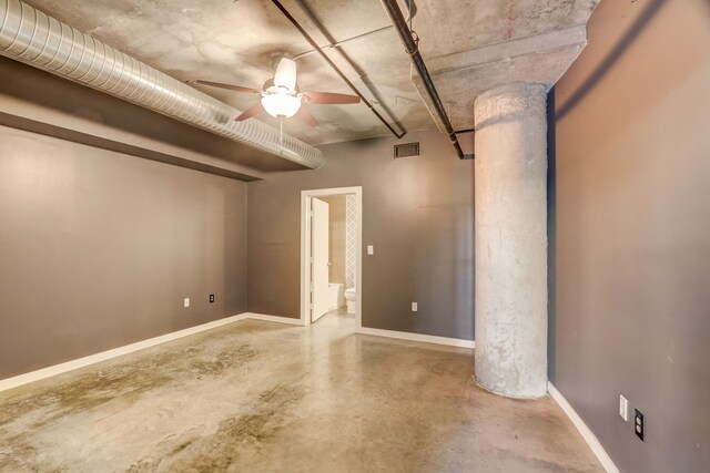 interior space with ceiling fan