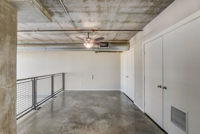 basement featuring ceiling fan