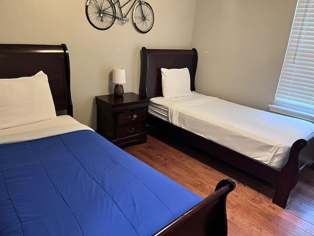 bedroom featuring wood-type flooring