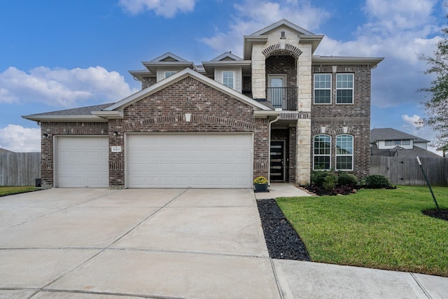 view of front of property featuring a balcony, a front lawn, and a garage