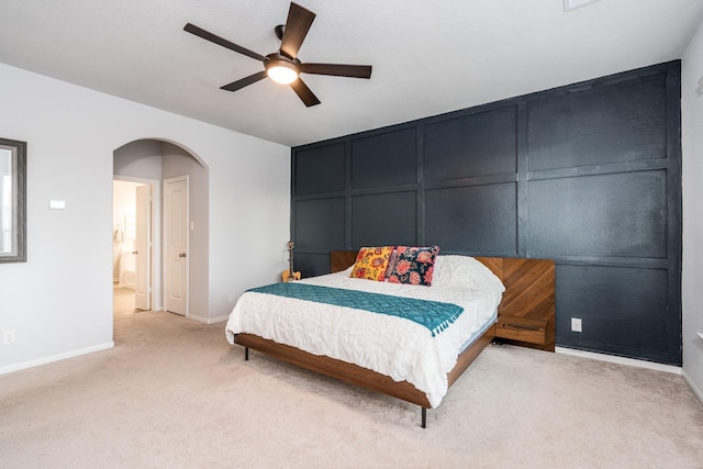 bedroom featuring ceiling fan and light colored carpet