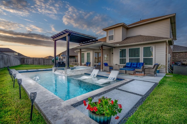 exterior space featuring a lawn, an outdoor living space, a pergola, ceiling fan, and an in ground hot tub