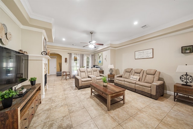 living room featuring light tile patterned floors, ceiling fan, and ornamental molding