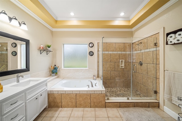 bathroom with tile patterned floors, vanity, separate shower and tub, and crown molding