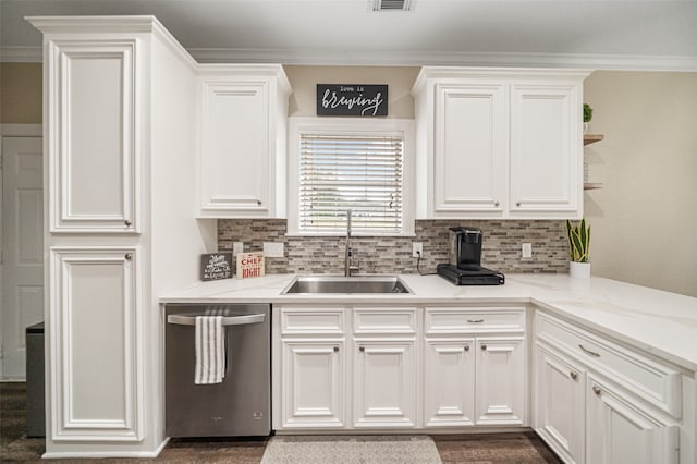 kitchen with crown molding, white cabinetry, sink, and stainless steel dishwasher