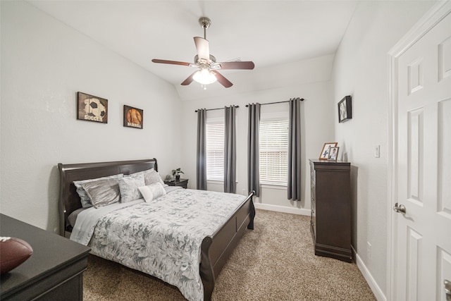 bedroom with ceiling fan, light carpet, and lofted ceiling