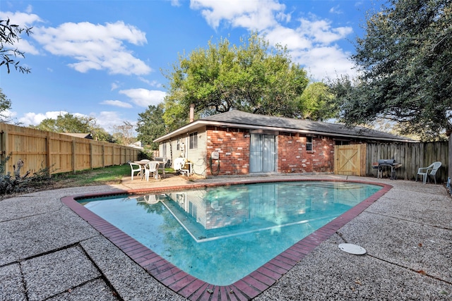 view of pool featuring a patio area