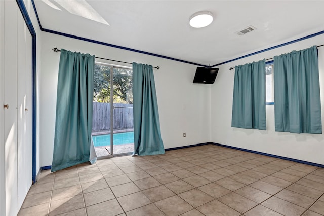 view of tiled spare room