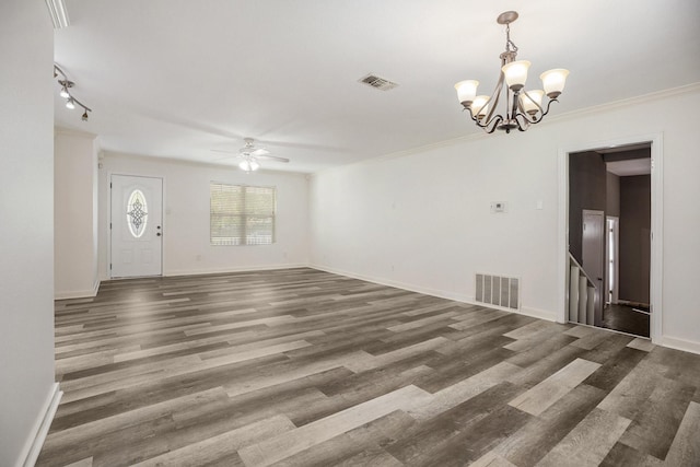 interior space featuring dark hardwood / wood-style flooring, ceiling fan with notable chandelier, and crown molding