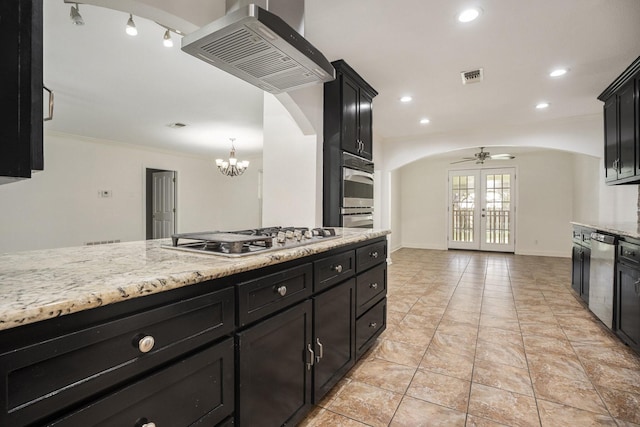 kitchen featuring french doors, ventilation hood, ceiling fan with notable chandelier, crown molding, and stainless steel appliances