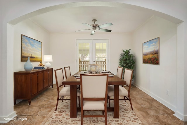 dining room featuring french doors, ceiling fan, and crown molding