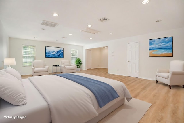 bedroom featuring light hardwood / wood-style floors