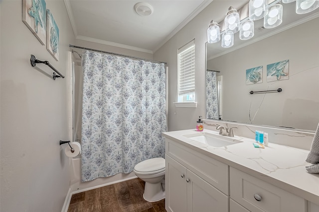 bathroom featuring toilet, hardwood / wood-style flooring, vanity, crown molding, and walk in shower