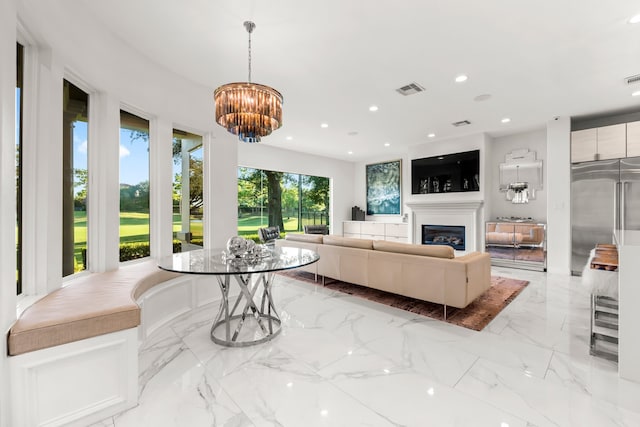 living room with an inviting chandelier