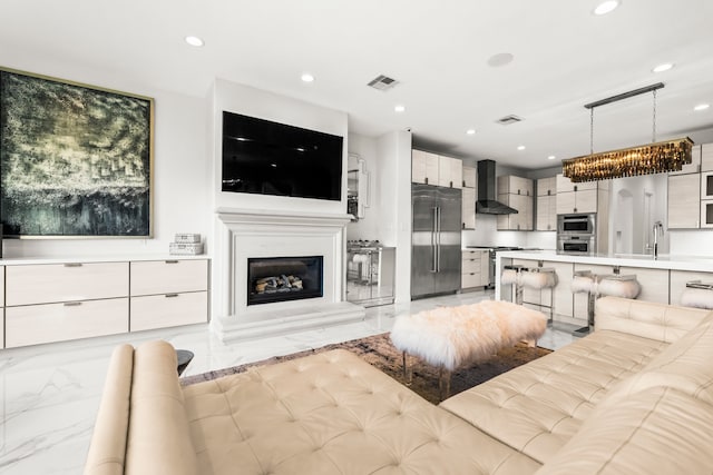 living room featuring a chandelier