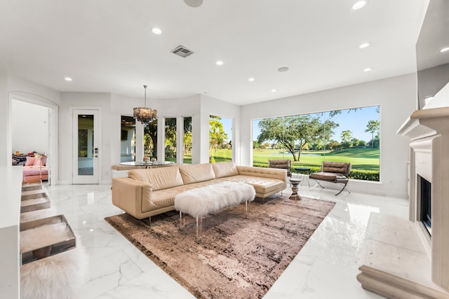 living room with a notable chandelier