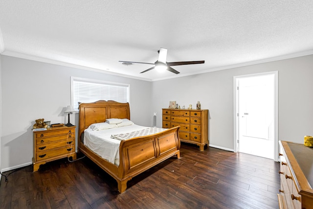 bedroom featuring ceiling fan, dark hardwood / wood-style floors, and crown molding