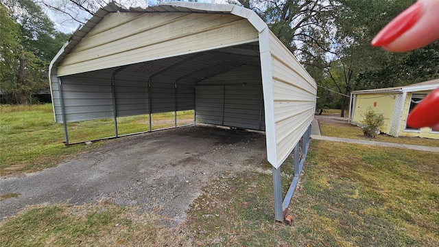 exterior space with a carport and a lawn