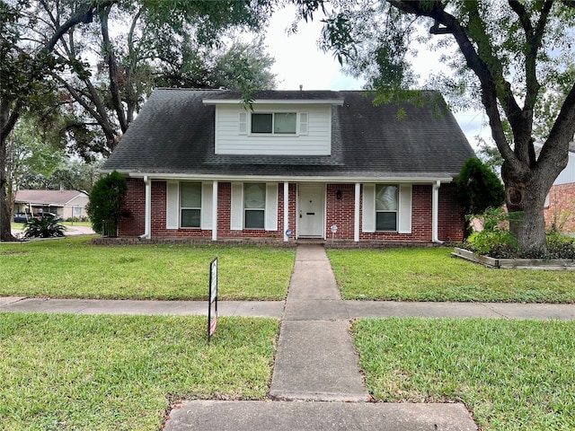 bungalow-style house featuring a front yard