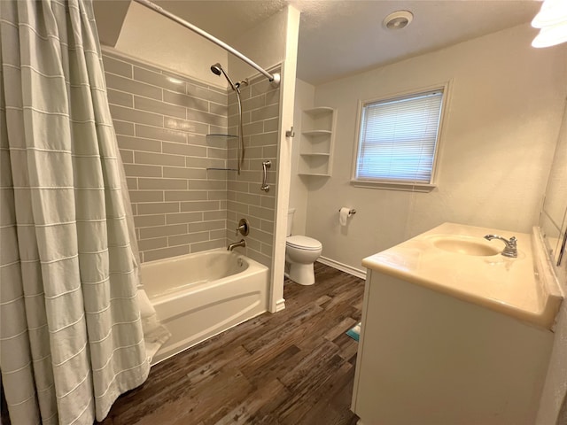 full bathroom with toilet, shower / tub combo with curtain, vanity, and hardwood / wood-style floors