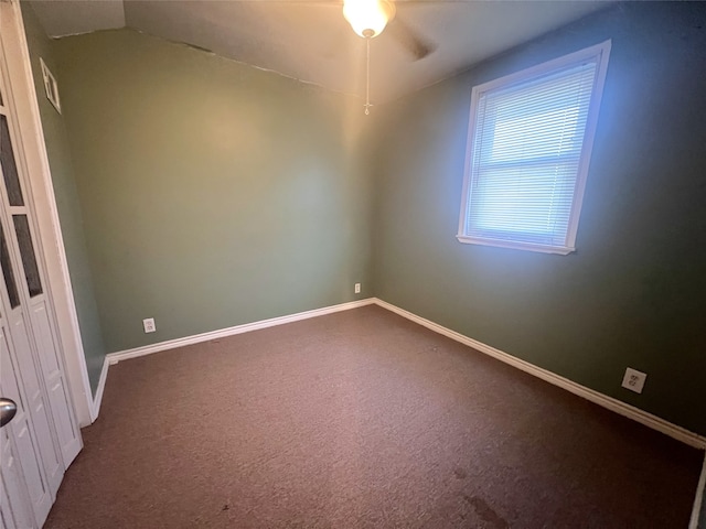 carpeted empty room with ceiling fan