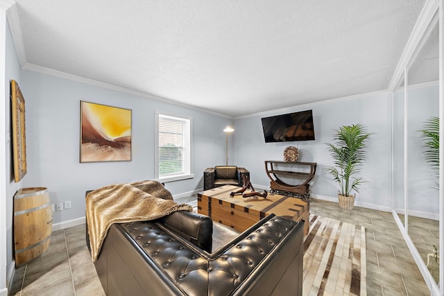 living room featuring ornamental molding, a textured ceiling, and light tile patterned floors