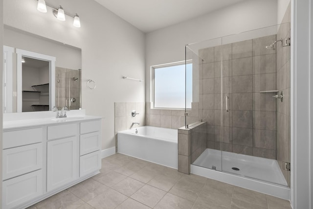 bathroom with separate shower and tub, tile patterned flooring, and vanity