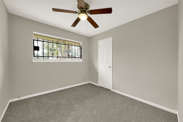 carpeted empty room with ceiling fan