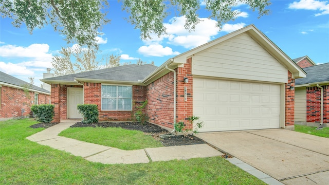 ranch-style home with a front yard and a garage