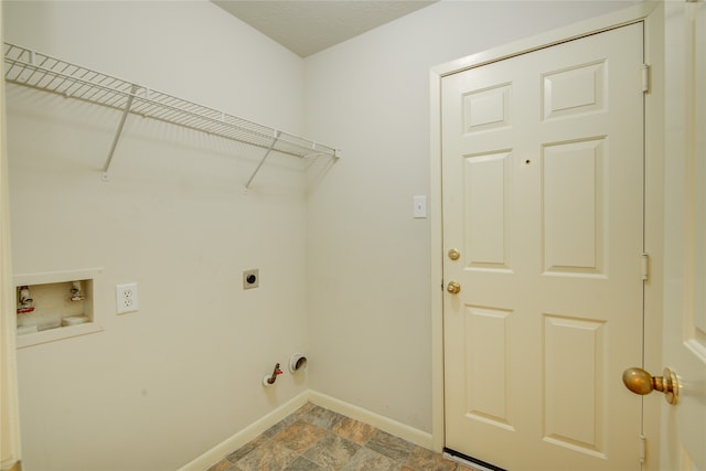 laundry area with hookup for an electric dryer, washer hookup, and hookup for a gas dryer