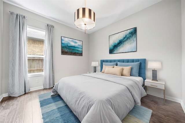 bedroom featuring hardwood / wood-style floors