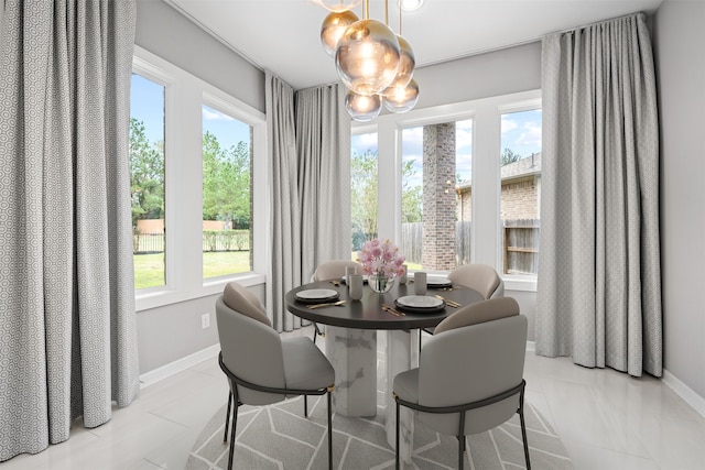 dining space with plenty of natural light