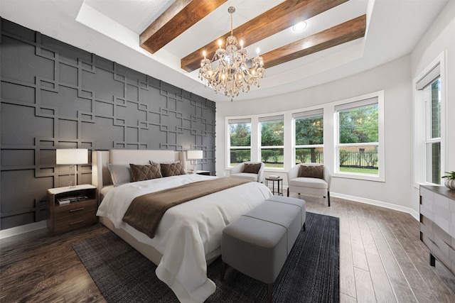 bedroom featuring dark hardwood / wood-style flooring, a chandelier, a raised ceiling, and beam ceiling