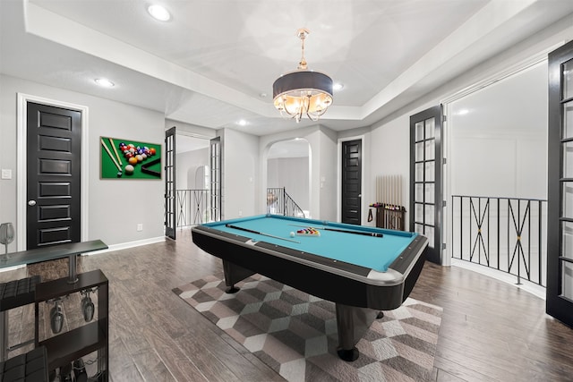 playroom featuring pool table, dark hardwood / wood-style flooring, and a raised ceiling