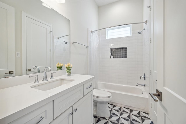 309 W Pierce St, Houston, TX 77019 - bathroom featuring shower / tub combo, toilet, vanity, and tile patterned floors