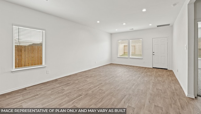 empty room featuring light hardwood / wood-style flooring