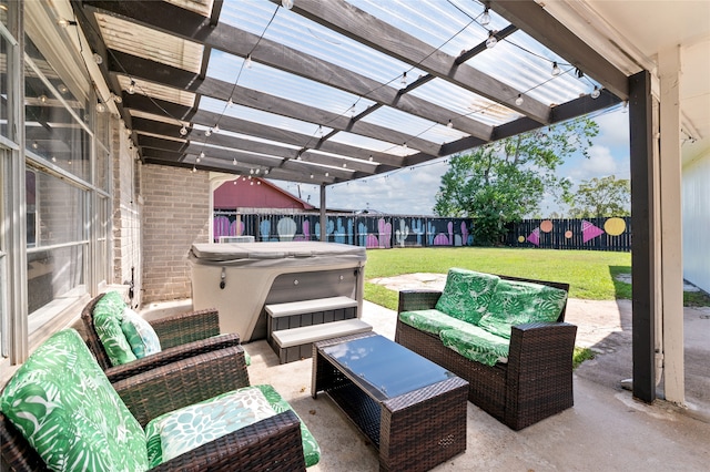 view of patio featuring a hot tub and an outdoor living space