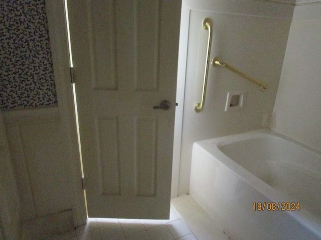 bathroom featuring tile patterned floors and plus walk in shower