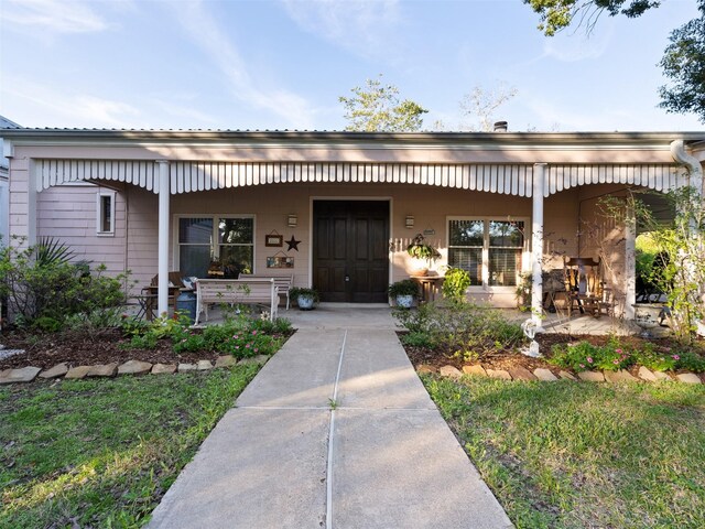 view of front of home featuring covered porch