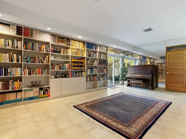 sitting room featuring light tile patterned floors