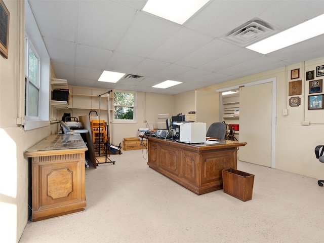 office area featuring a paneled ceiling